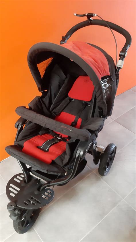 Otroški voziček Jane Slalom Pro v oranžno-zeleno-modri barvi