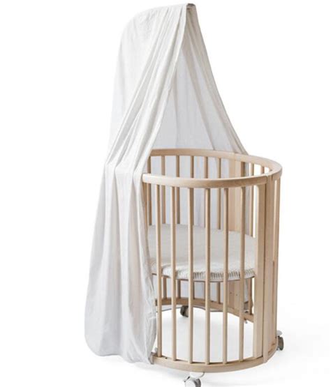 Stokke Sleepi posteljica v uporabi z dojenčkom