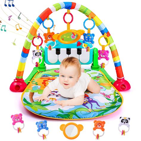 baby playing on a colorful play mat