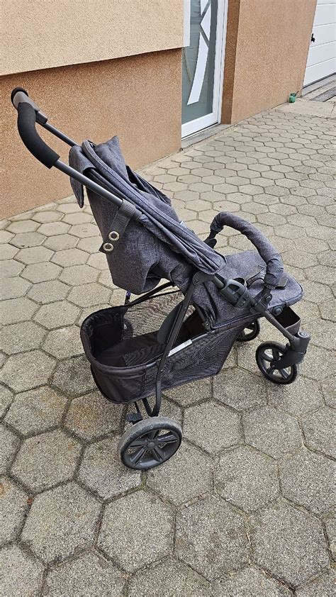 lahek otroški voziček TIK zložen kot dežnik