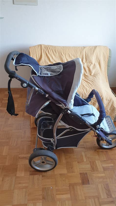 otroški voziček trikolesnik