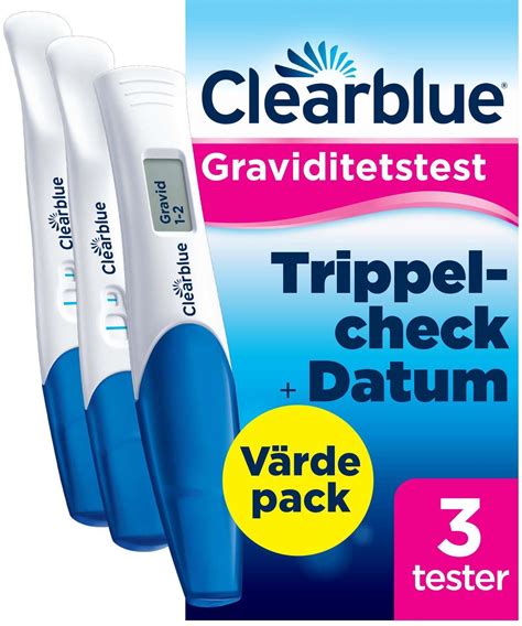 Ženska, ki drži v roki test Clearblue Ultra Early