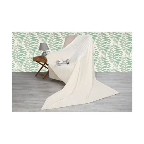 Jukki pletena bombažna odeja v uporabi