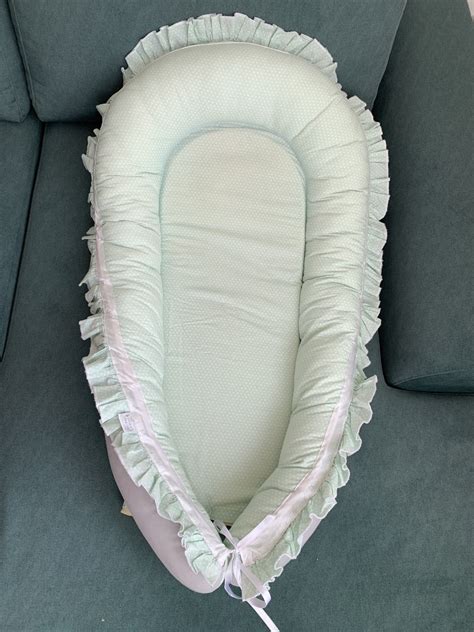 Grelno gnezdece za novorojenčka