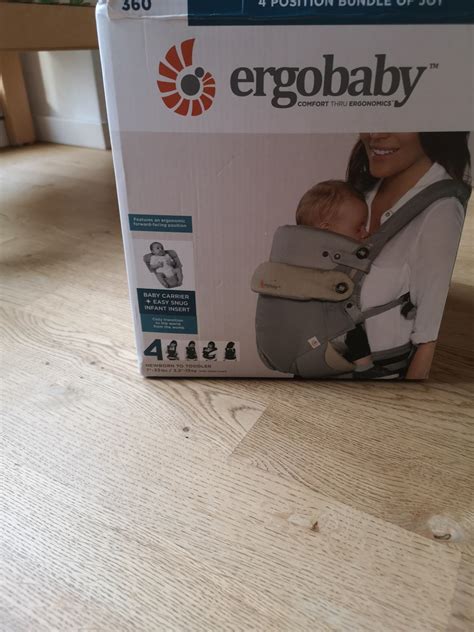 Ergobaby nosilka z vstavekom za novorojenčka