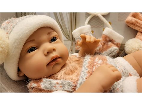 Dojenček v oblačilih