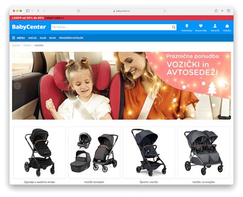 Notranjost trgovine Baby Center z razstavljenimi otroškimi vozički