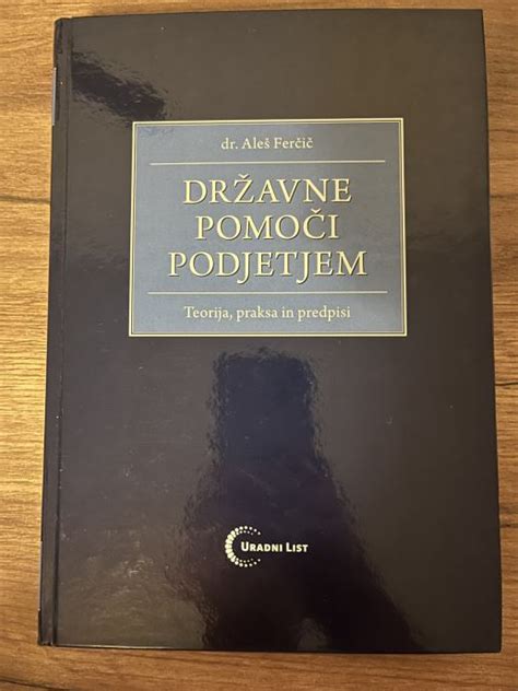 Simbolični prikaz denarne pomoči in knjige