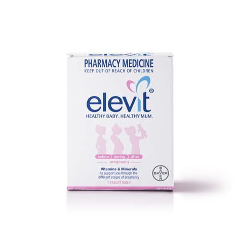 Nosečnica jemlje vitaminsko tableto Elevit ob obroku.