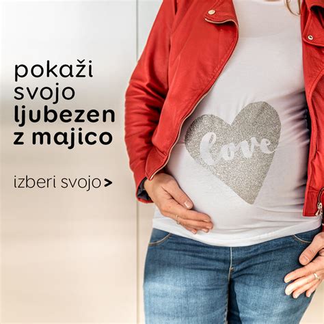 Ženska si izbira nosečniška oblačila