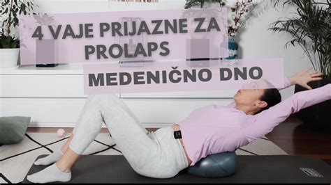 Nosečnica na masažni mizi z odprtino za trebuh