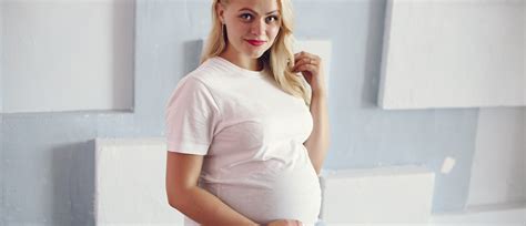 Ilustracija krave z označenimi znaki bližajočega se poroda