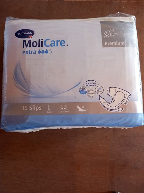 Diagram, ki prikazuje plasti sodobne plenice za odrasle in njihove funkcije (vpojnost, nevtralizacija vonja)