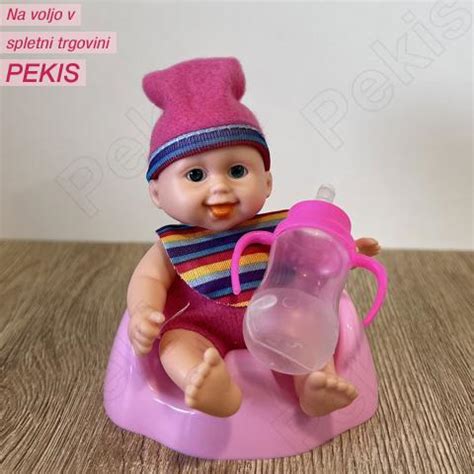 Simbolična slika, ki prikazuje dojenčka, ki zavrača dojko