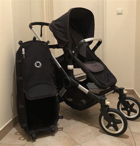 Otroški voziček z dodatno opremo