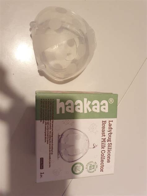 slika Haakaa kompresijskih blazinic v uporabi (toplo in hladno)