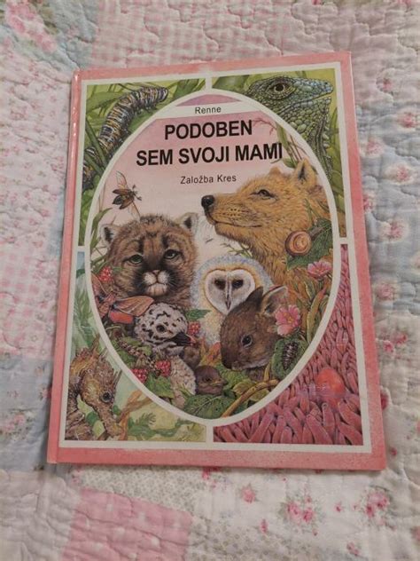 Novorojenček Akbar ob svoji mami