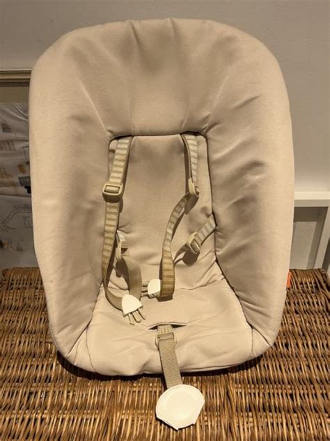 Detail Stokke® Vstavka za novorojenčka s poudarkom na varnostnem pasu