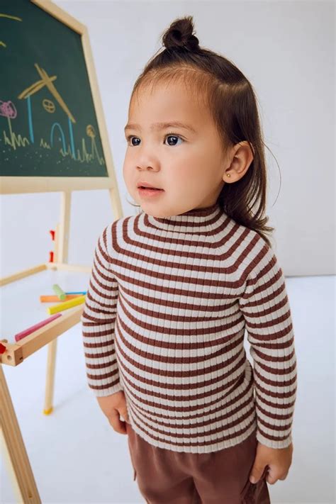 Ilustracija dojenčka z ekcemom na obrazu