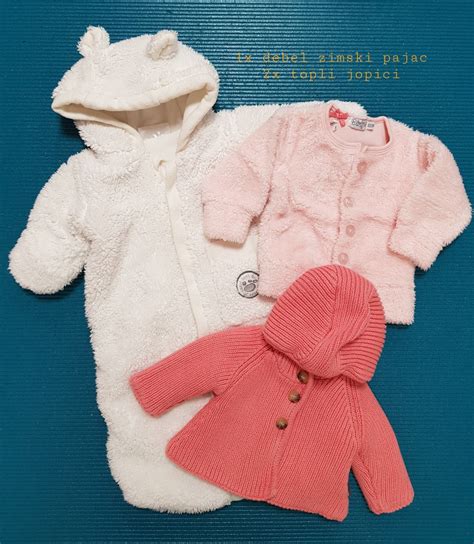 Novorojenček deklica v roza odejici